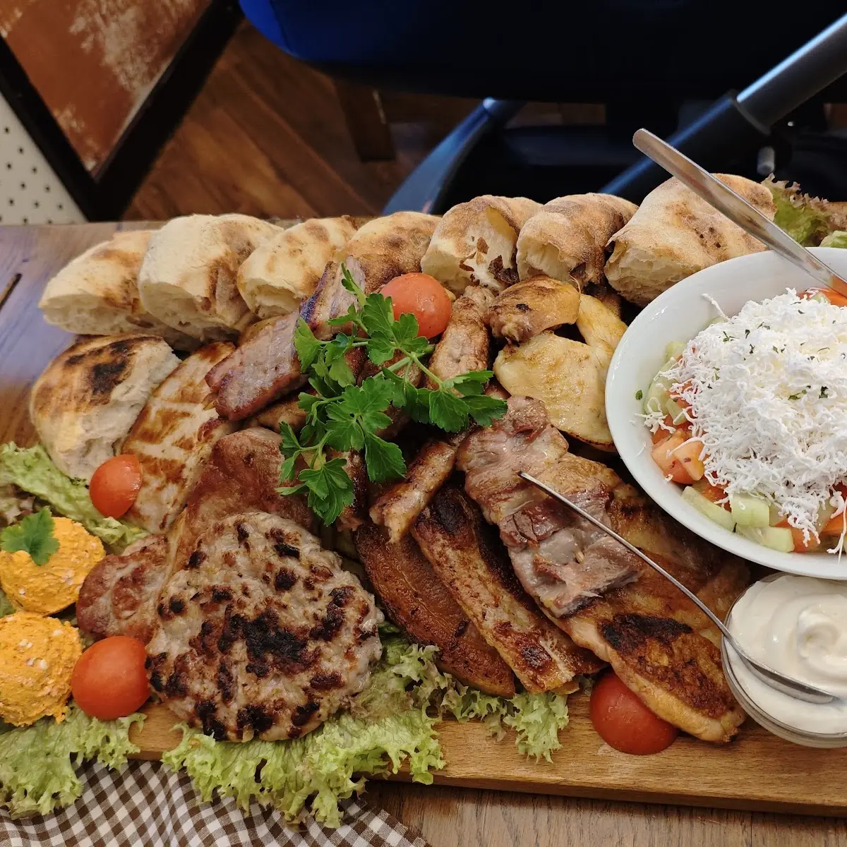 Grilled Meat Mix 1kg When Its Raw 2x Lepinja Bread 2x Balls of Urnebes and 1x Šopska Salad