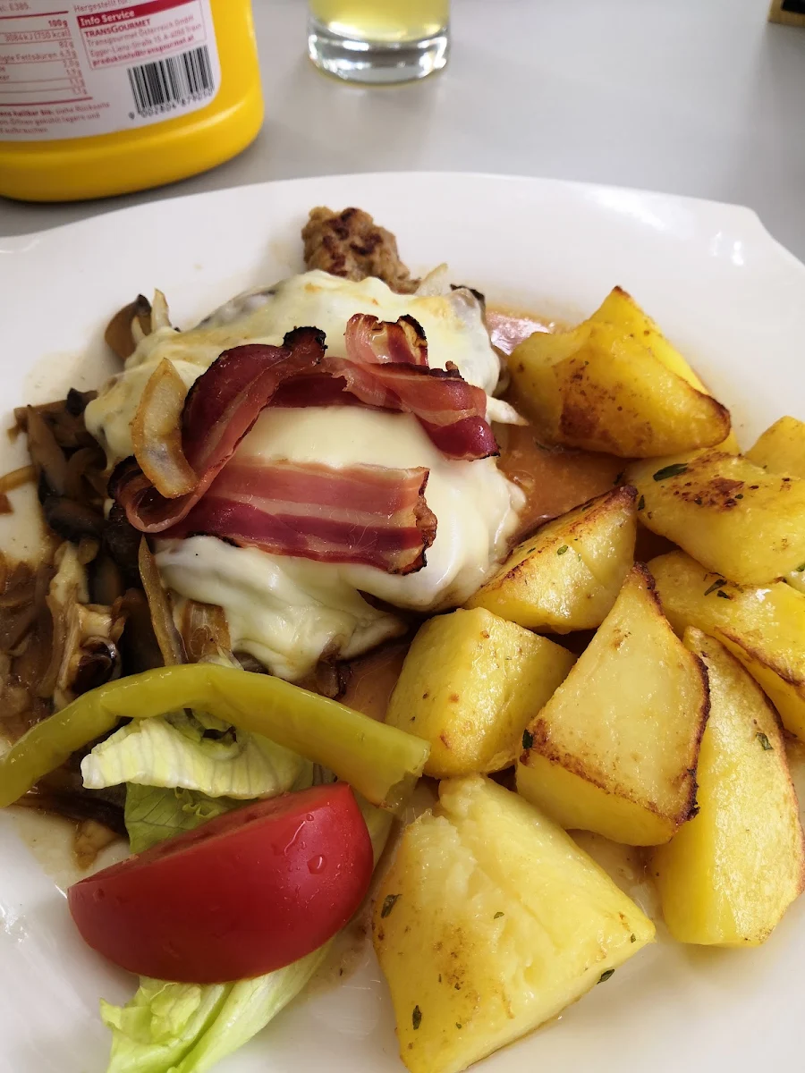Schweinesteak Mit Käse Und Speck