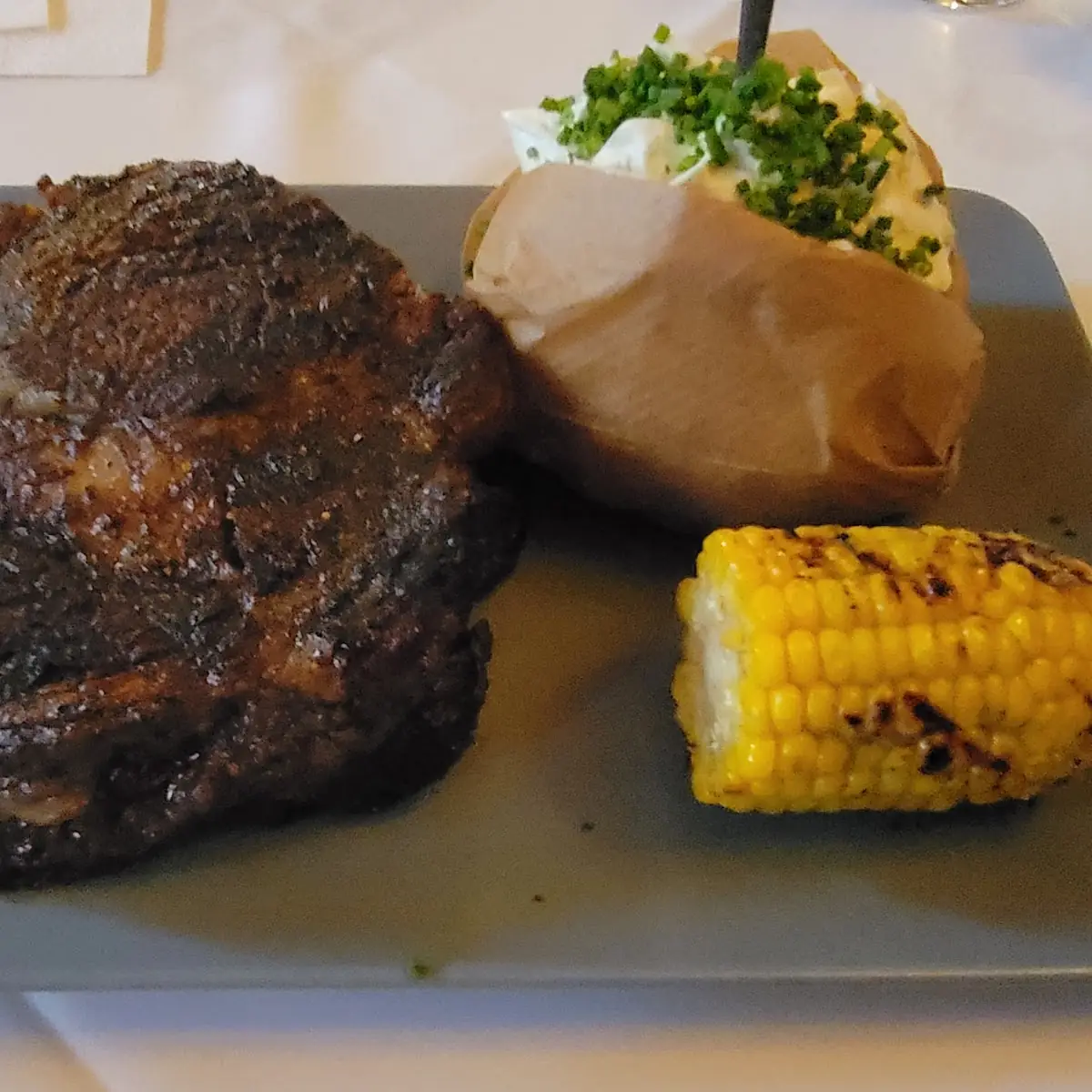 750g Ribeye with Baked Potato & Corn on the Cob