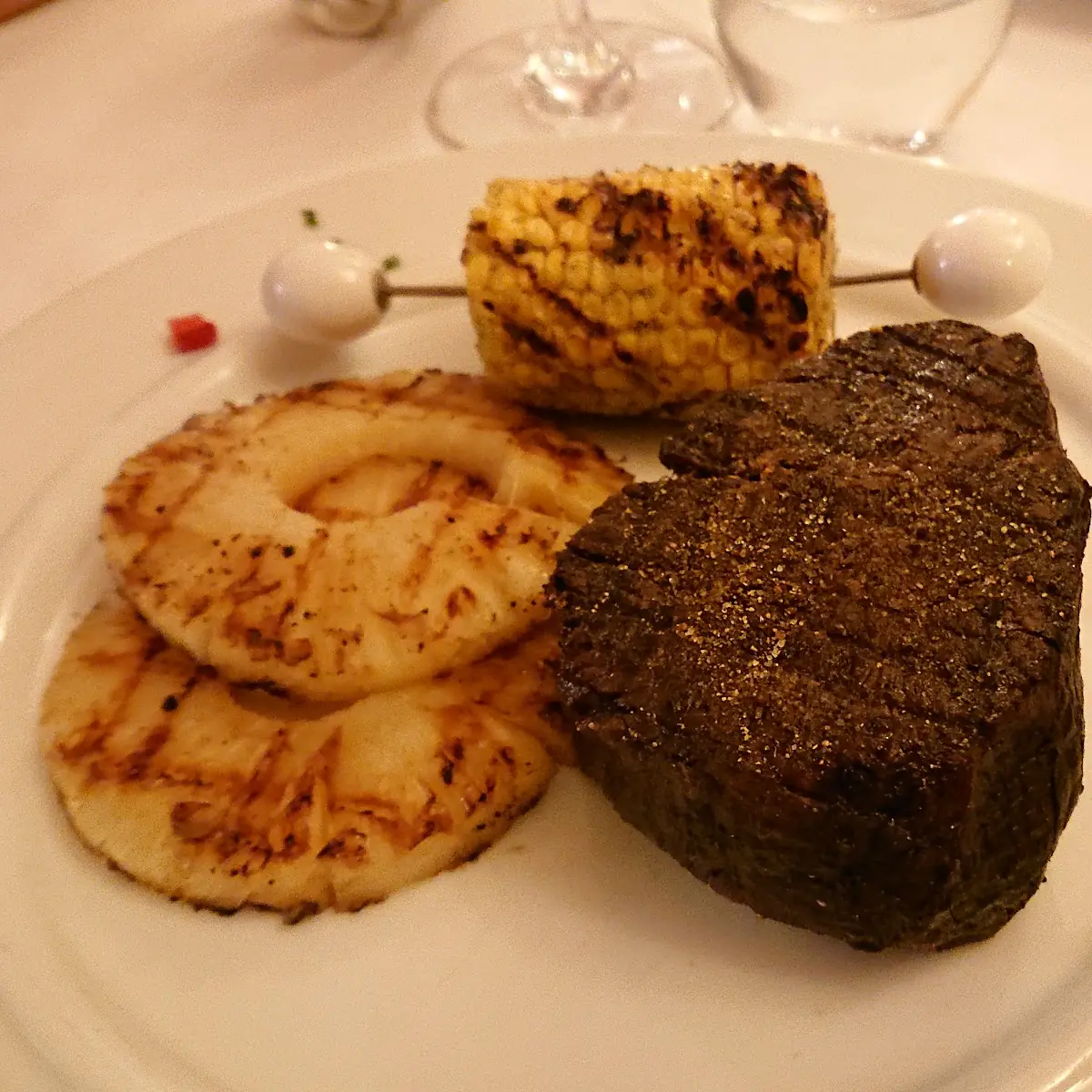 Tenderloin Steak with Fried Pineapple Rings and Corn on the Cob