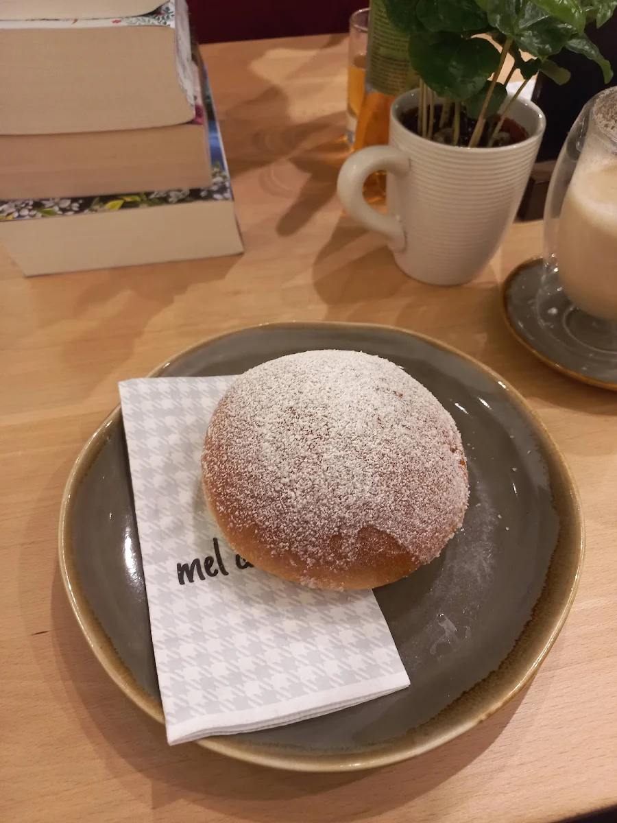 Latte Macchiato And Big Krapfen With Mermelade
