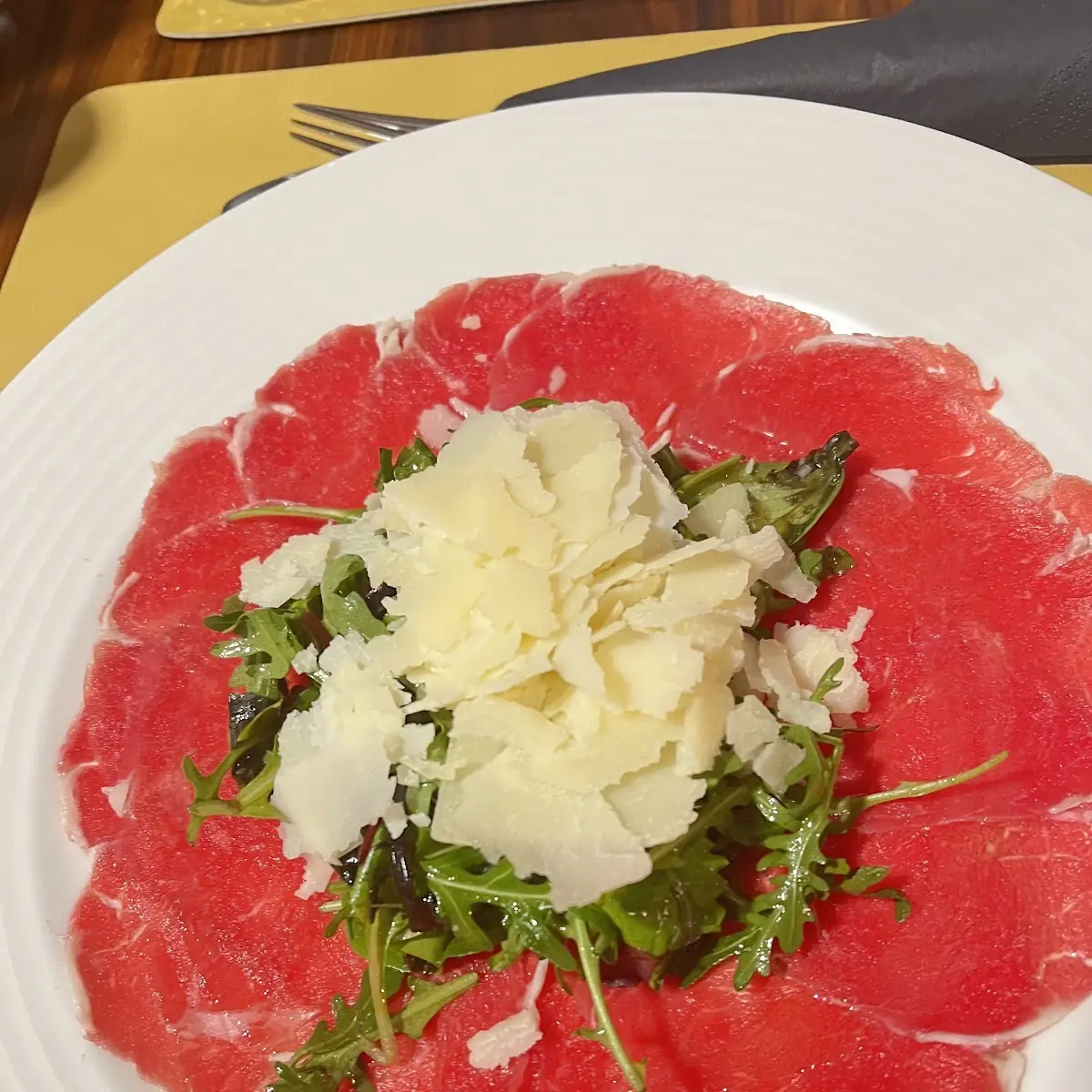 Beef Carpaccio with Rocket and Parmesan Cheese