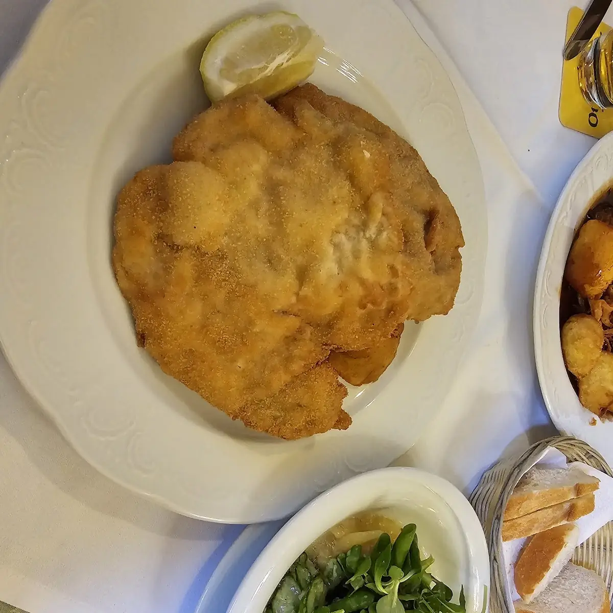 Wiener Schnitzel from Veal with Fried Potatoes & Mixed Salad