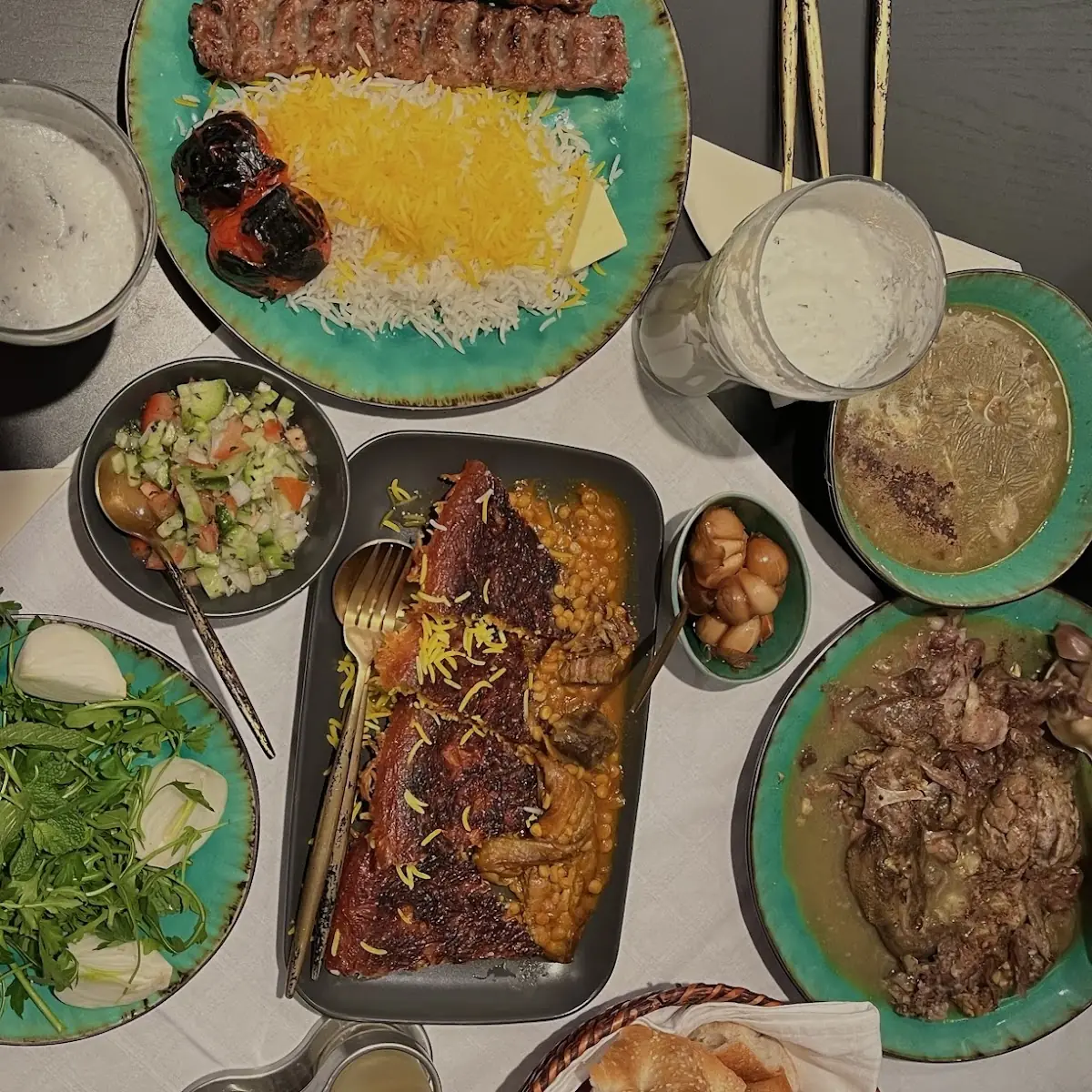 Tahdig Khoresh Gheymeh Salad Shirazi Kabob Koobideh Doogh Kale Pacheh Sir Torshi