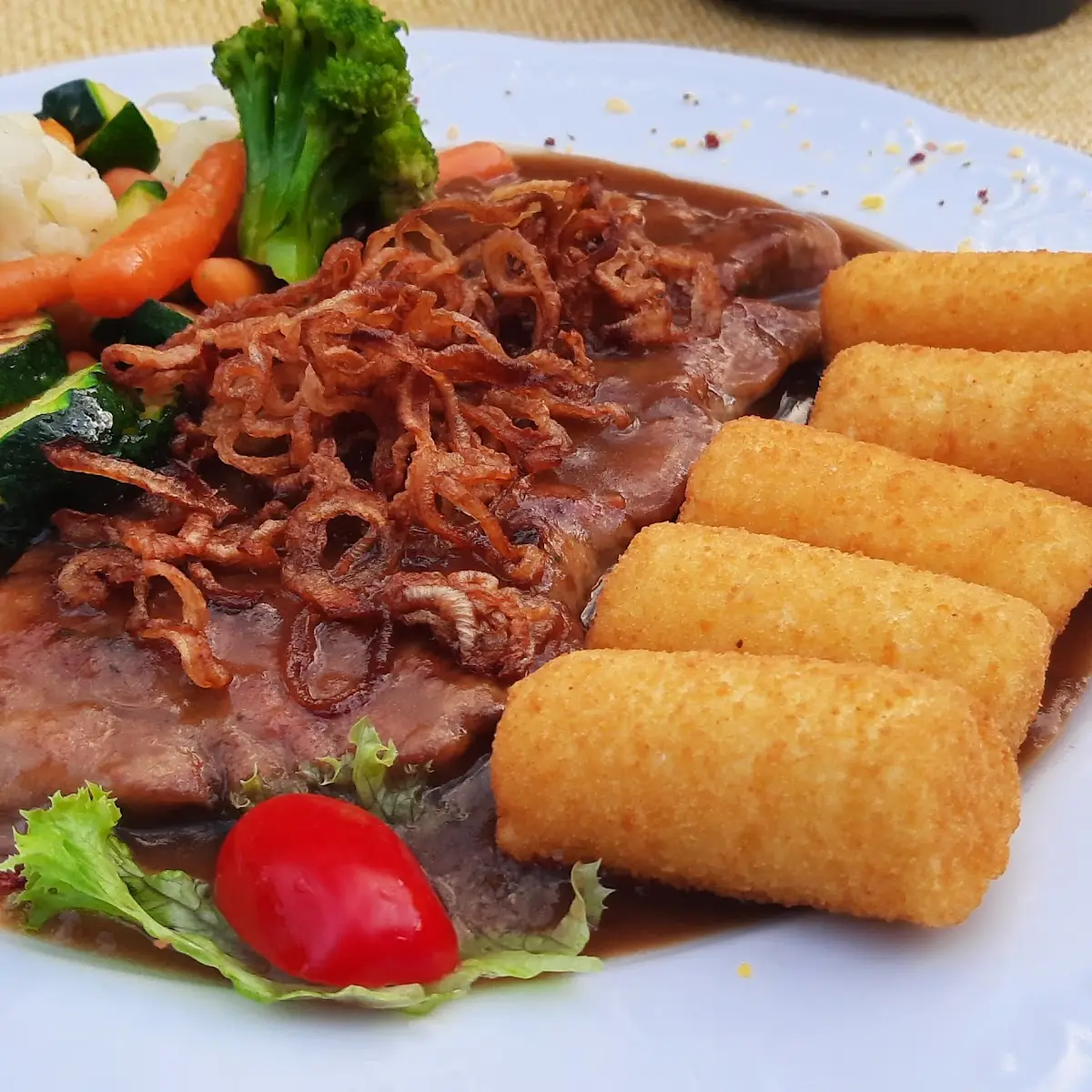 Steak with Onions