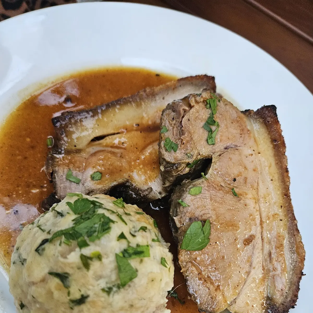 Krustenbraten With Semmelknödel Und Krautsalat