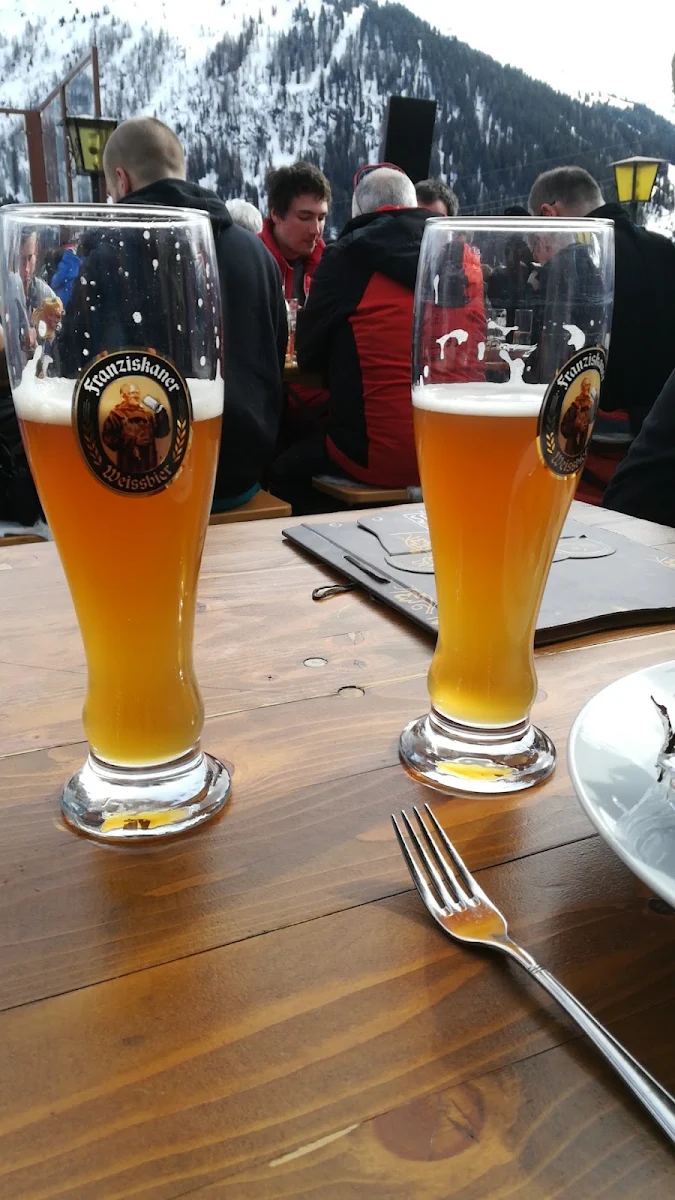 A Fantastic Franziskaner Draft Beer with the St Anton Mountain on Background