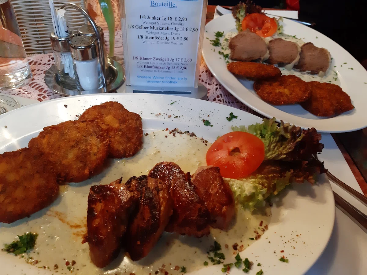 Schweinemedaillons Und Rindfleisch