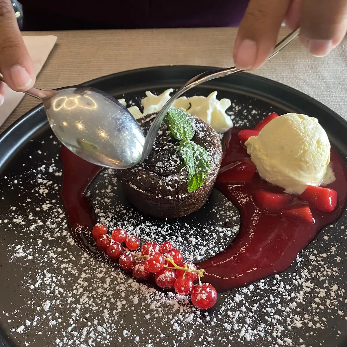 Chocolate Lava Cake with Vanilla Ice Cream and Strawberry Sauce