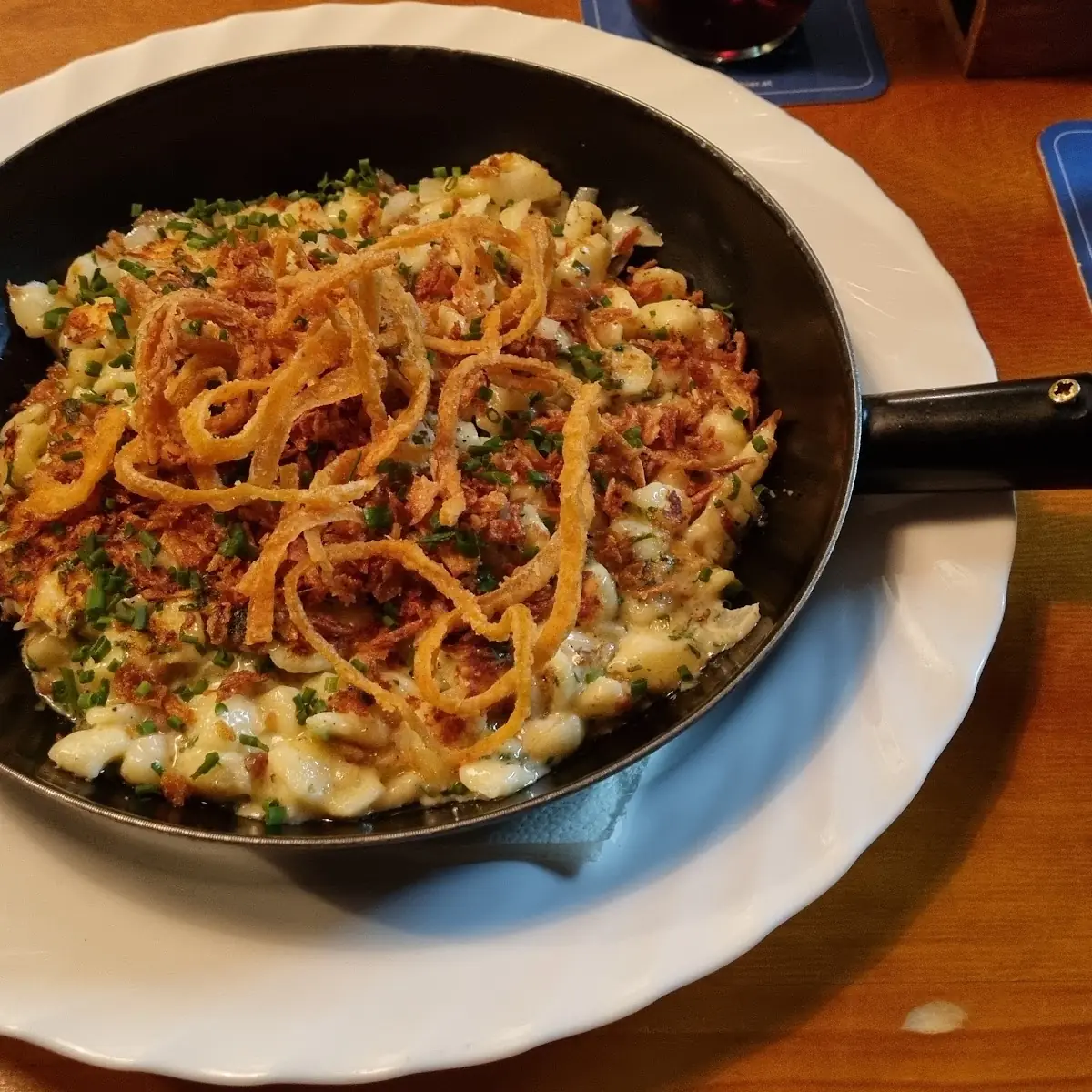Spätzle Roasted In A Pan With Cheese And Onion
