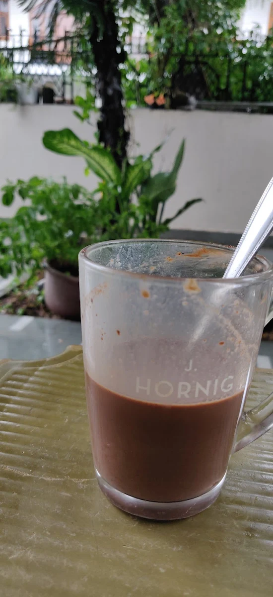 Enjoying Home Made Hot Chocolate in J Hornig Cup Way Far in India