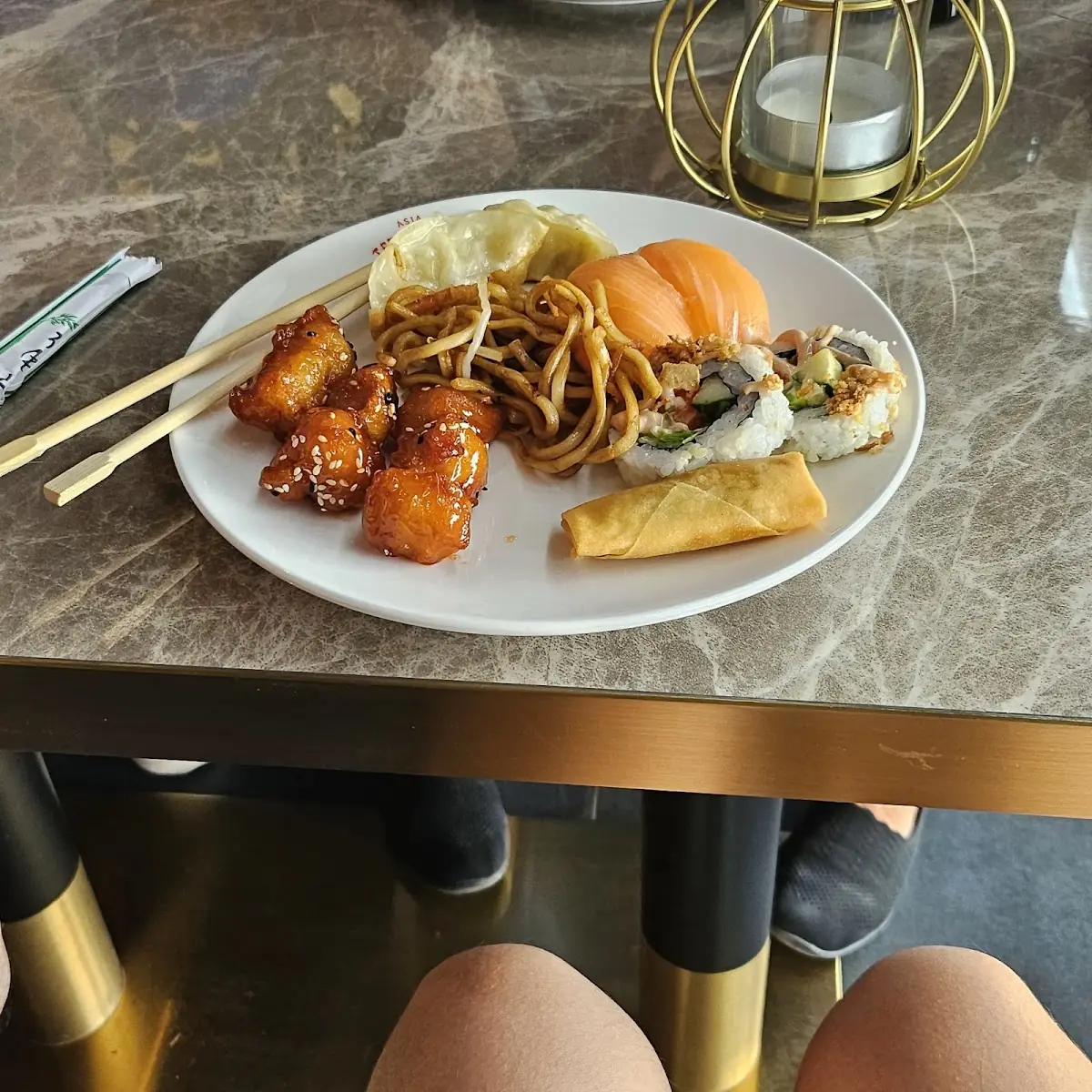 Korean Chiken Vegetable Noodles Mix Salmon Sashimi Dumplings and Egg Roll