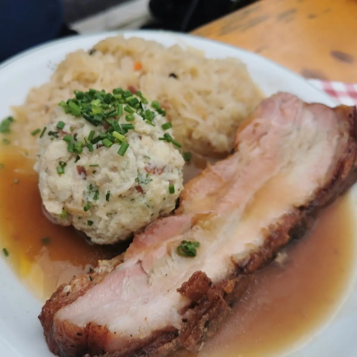 Speck Knoedel Mit Schweinebraten Und Sauerkraut