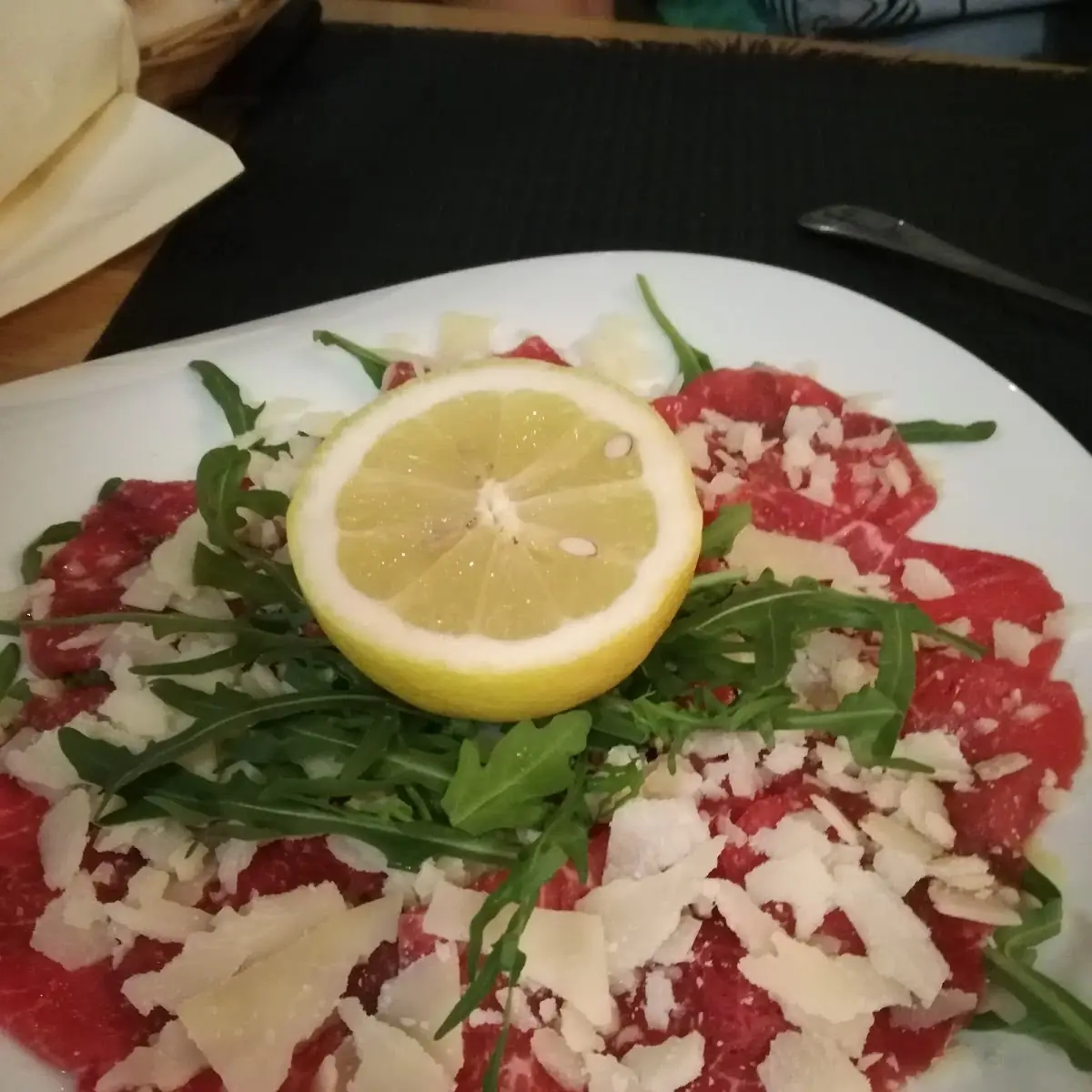 Carpacio Con Rucula