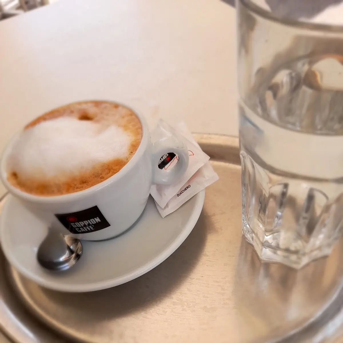 Coppion Caffè Melange Mit Glas Wasser