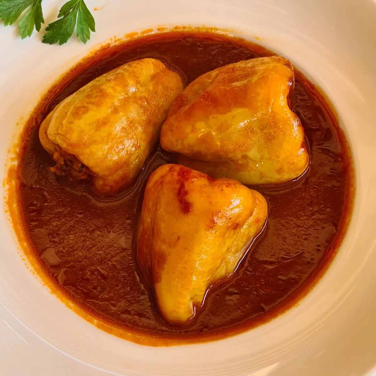 Gefüllte Paprika Mit Reis Und Faschiertem In Tomatensauce