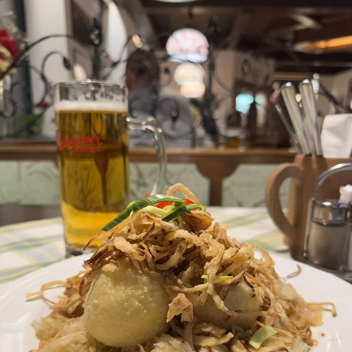 Homemade Potato Dumplings Filled with Pork Cracklings Sauerkraut and Roasted Onion
