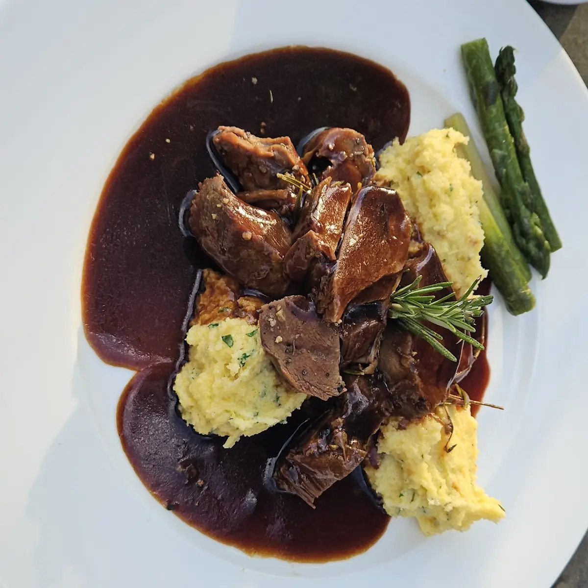 Sauteed Sweetbreads and Deep Fried Hour Egg Served