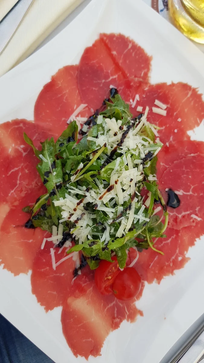 Rinder- Carpaggio Mit Rucola Und Grana Padano