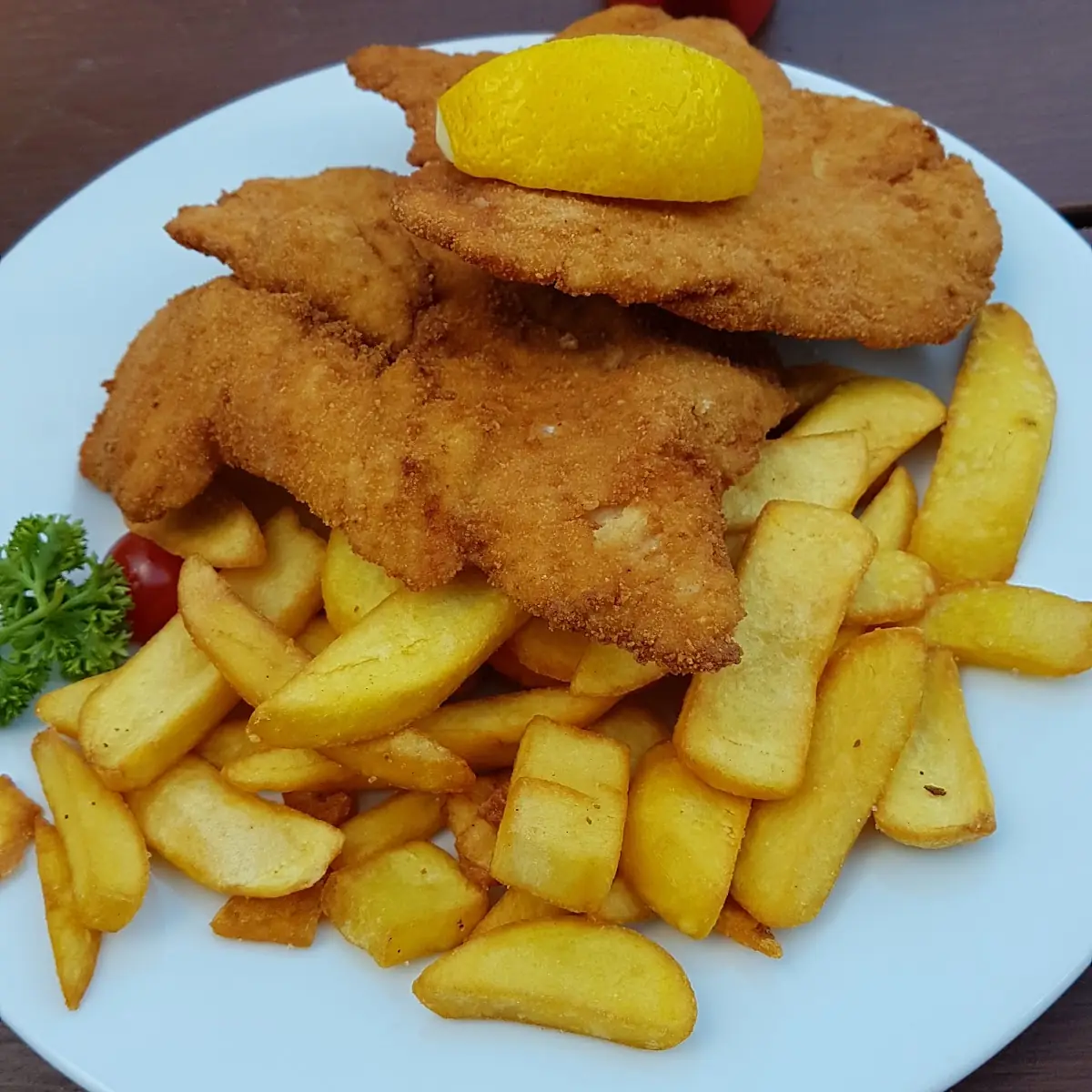 Putenschnitzel Paniert Mit Pommes Frites