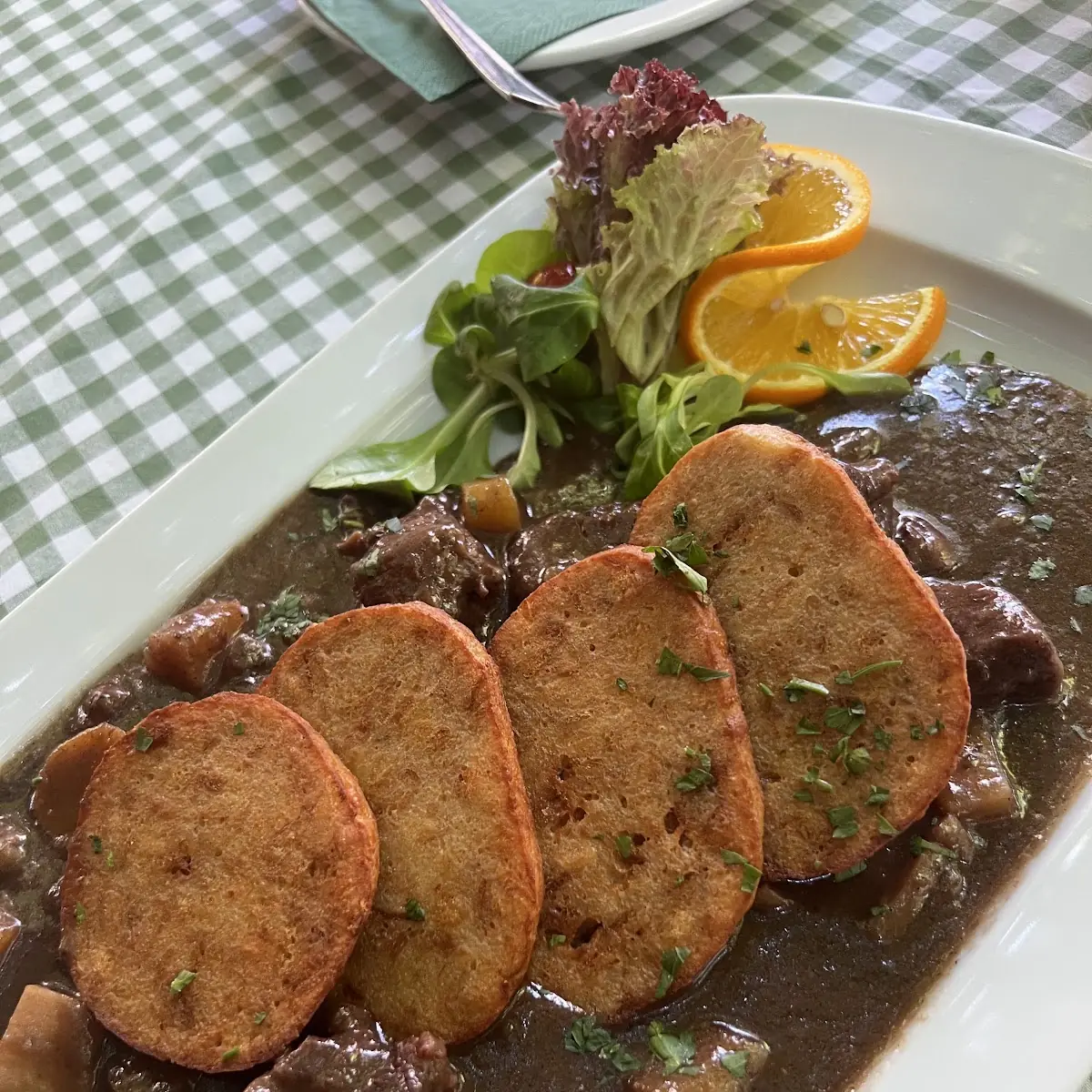 Beef Stew in Hungarian Paprika Sauce Served with Bread Dumpling