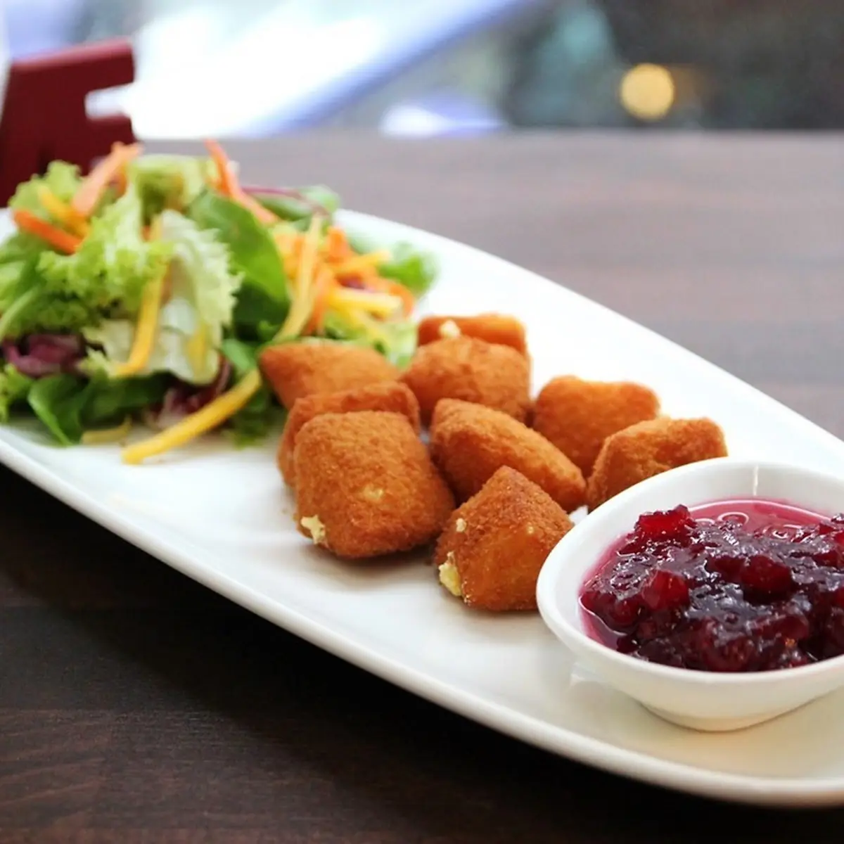 Fried Cheese with Lingonberry Jam and Salad