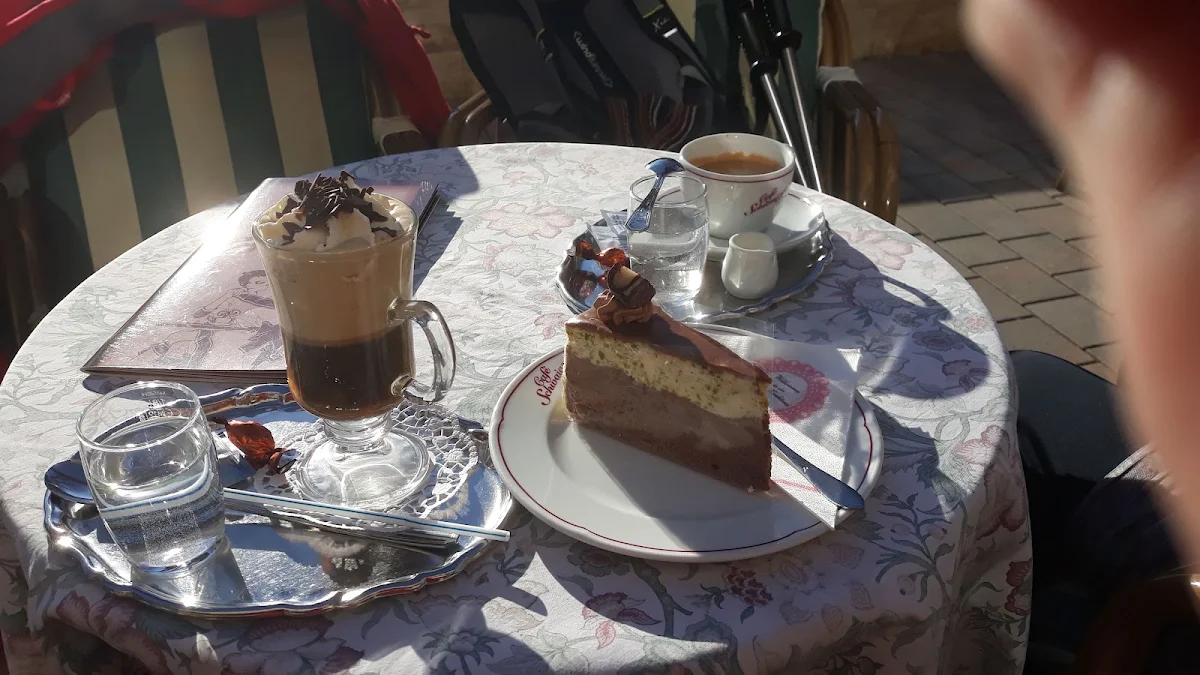 One Einspanner Coffee One Verlangerer Coffee And Mozart Cake