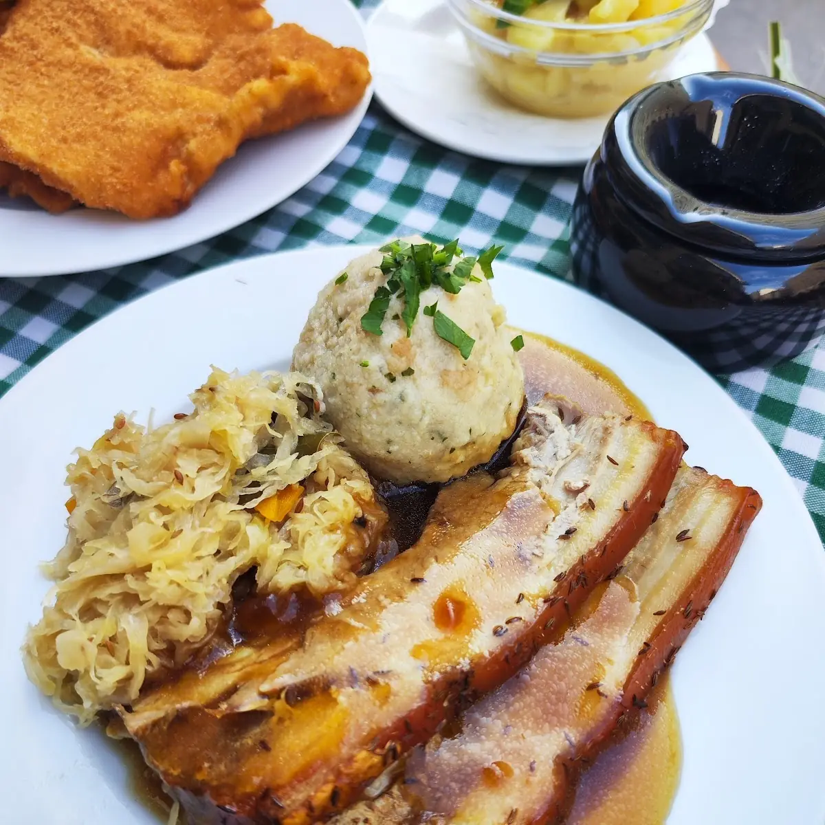 Roast Pork with a Stew of Pumpkin and White Cabbage and Bread Dumplings