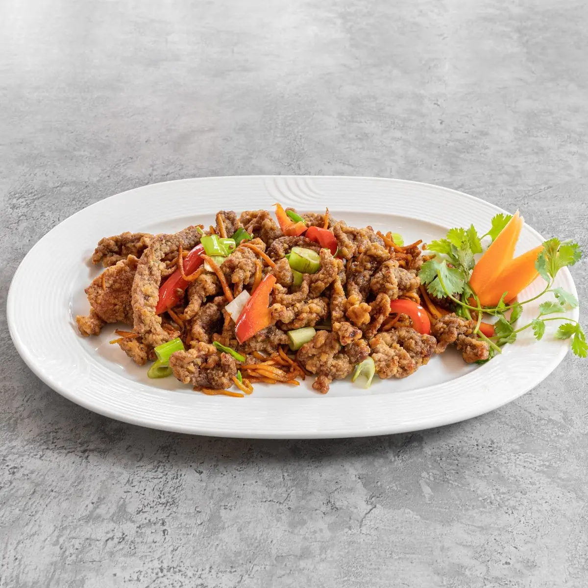 Paniertes Hühnerfleisch (süß-sauer)