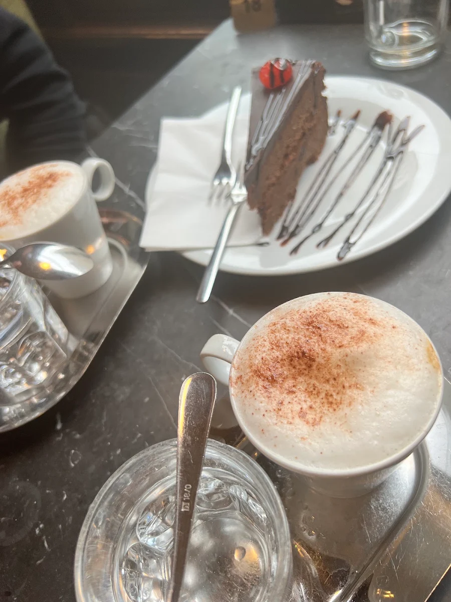Sachertorte And Cappuccino