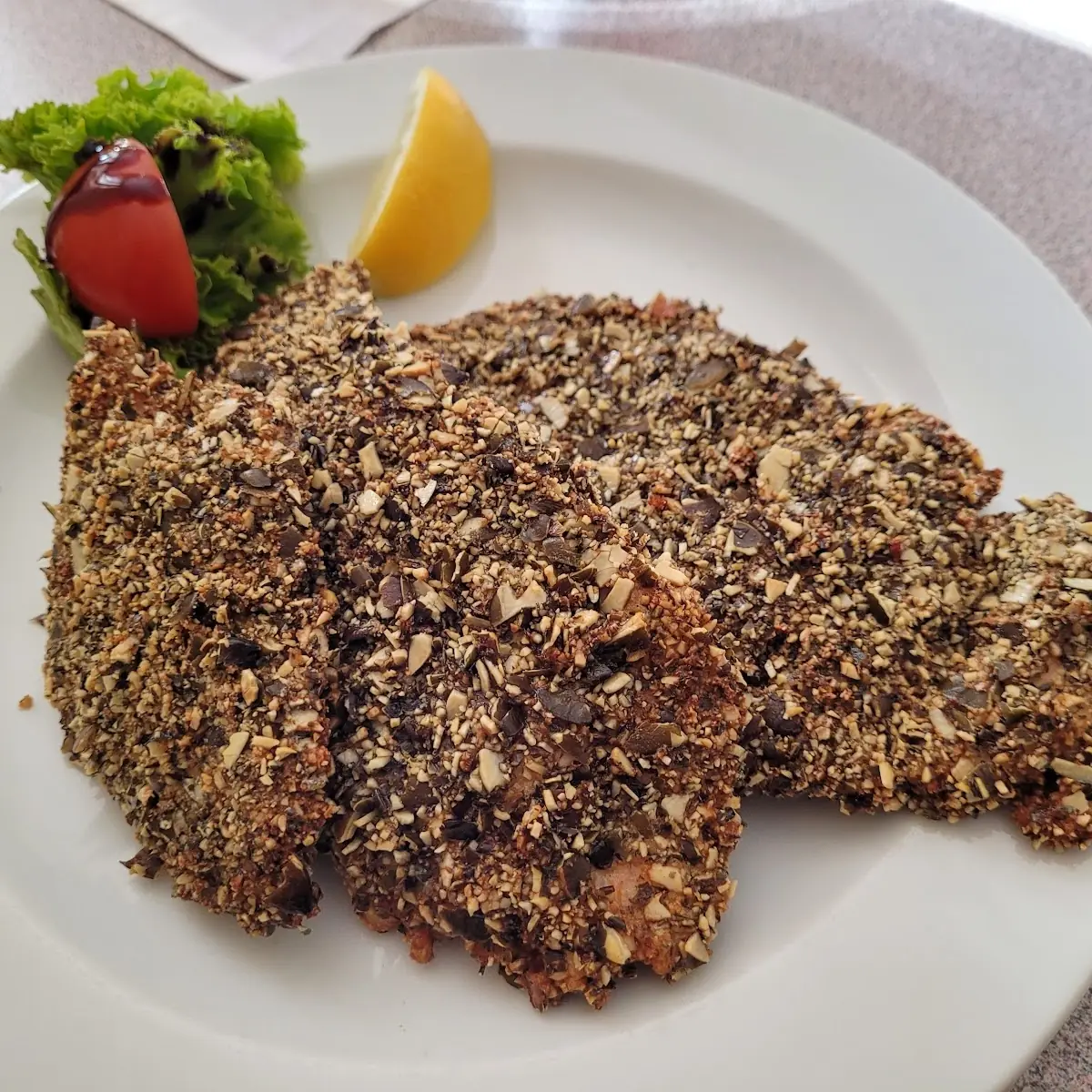 Hirschschnitzel In Der Kürbispanade Mit Erdäpfel Vogerlsalat