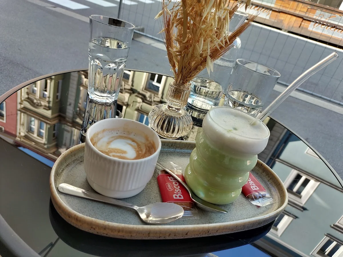Left Flat Whit Right Matcha Latte
