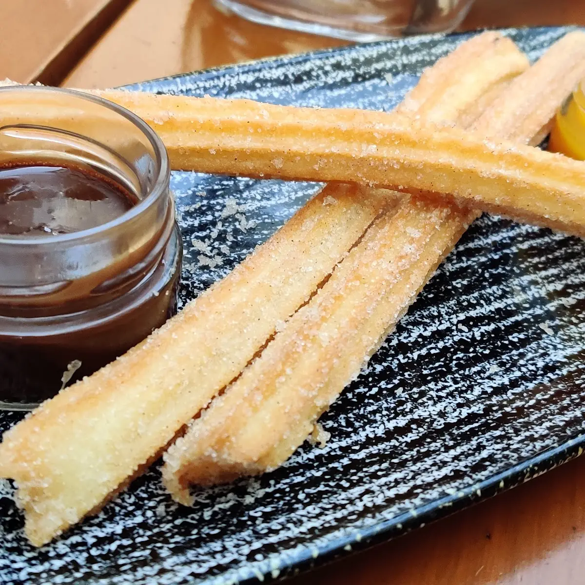 Churros with Chocolate and Mango Sauce