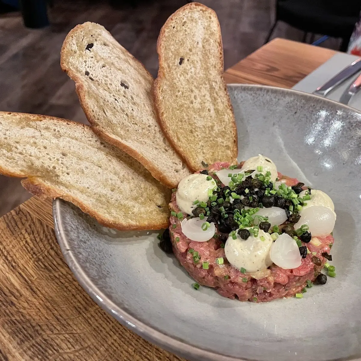 Beef Tartar with Carpers Pearl Onions & Truffle Mayo