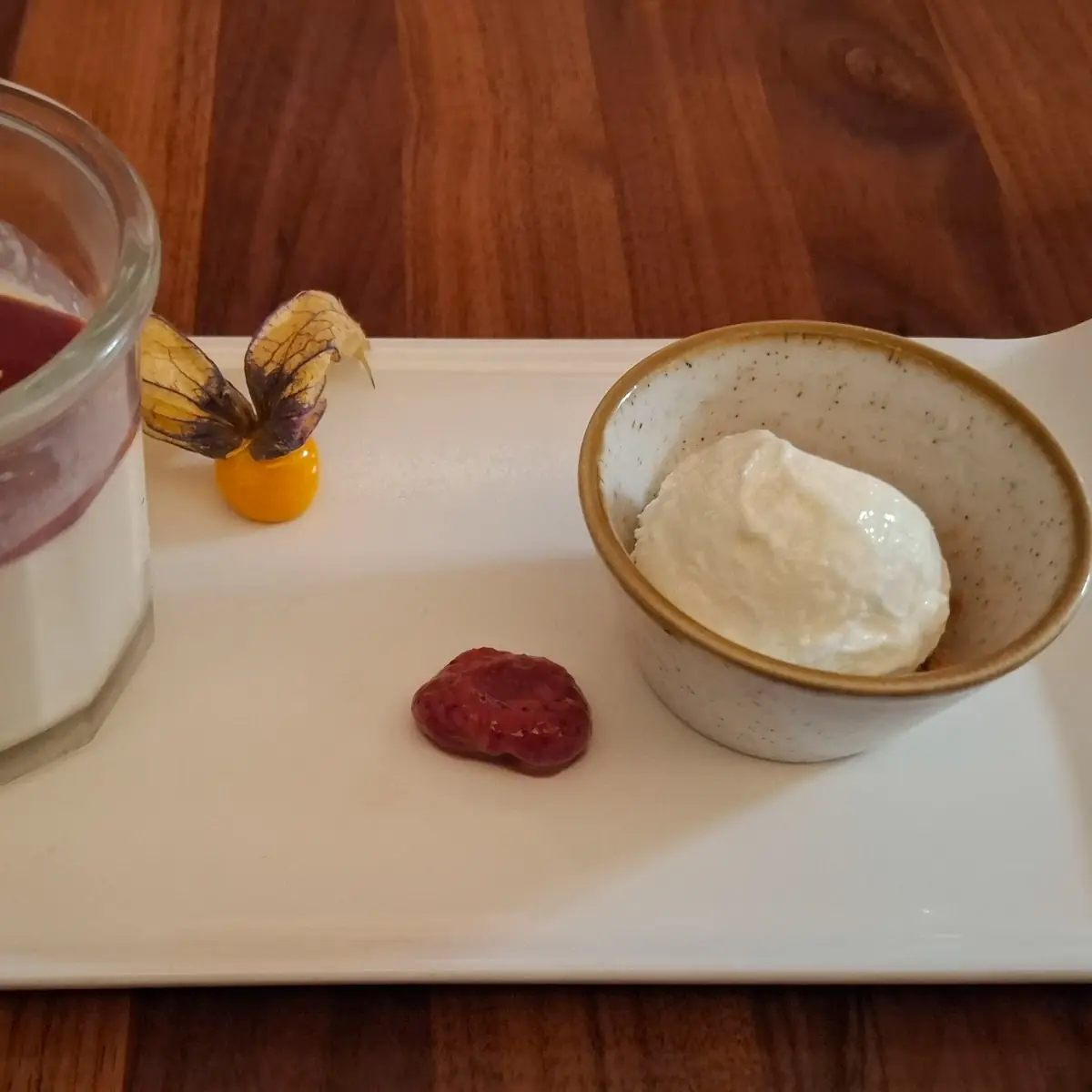 Panna Cotta With Strawberry Sauce And A Scoop Fior Di Latte Ice Cream
