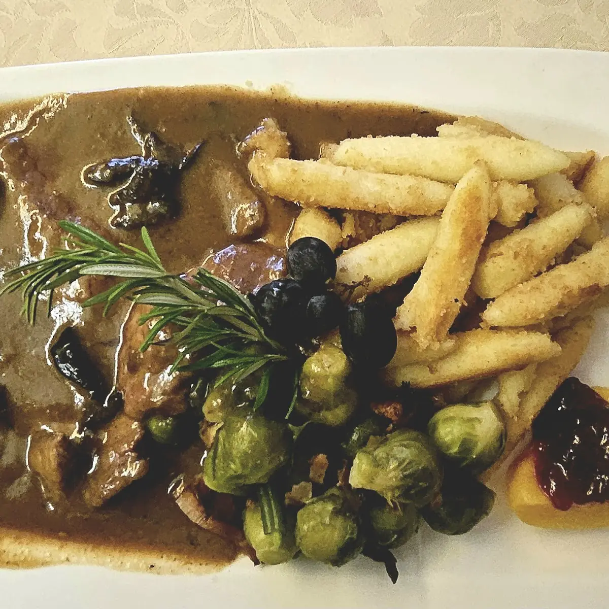 Hirschschnitzel Mit Schöpfungen Und Kohlsprossen