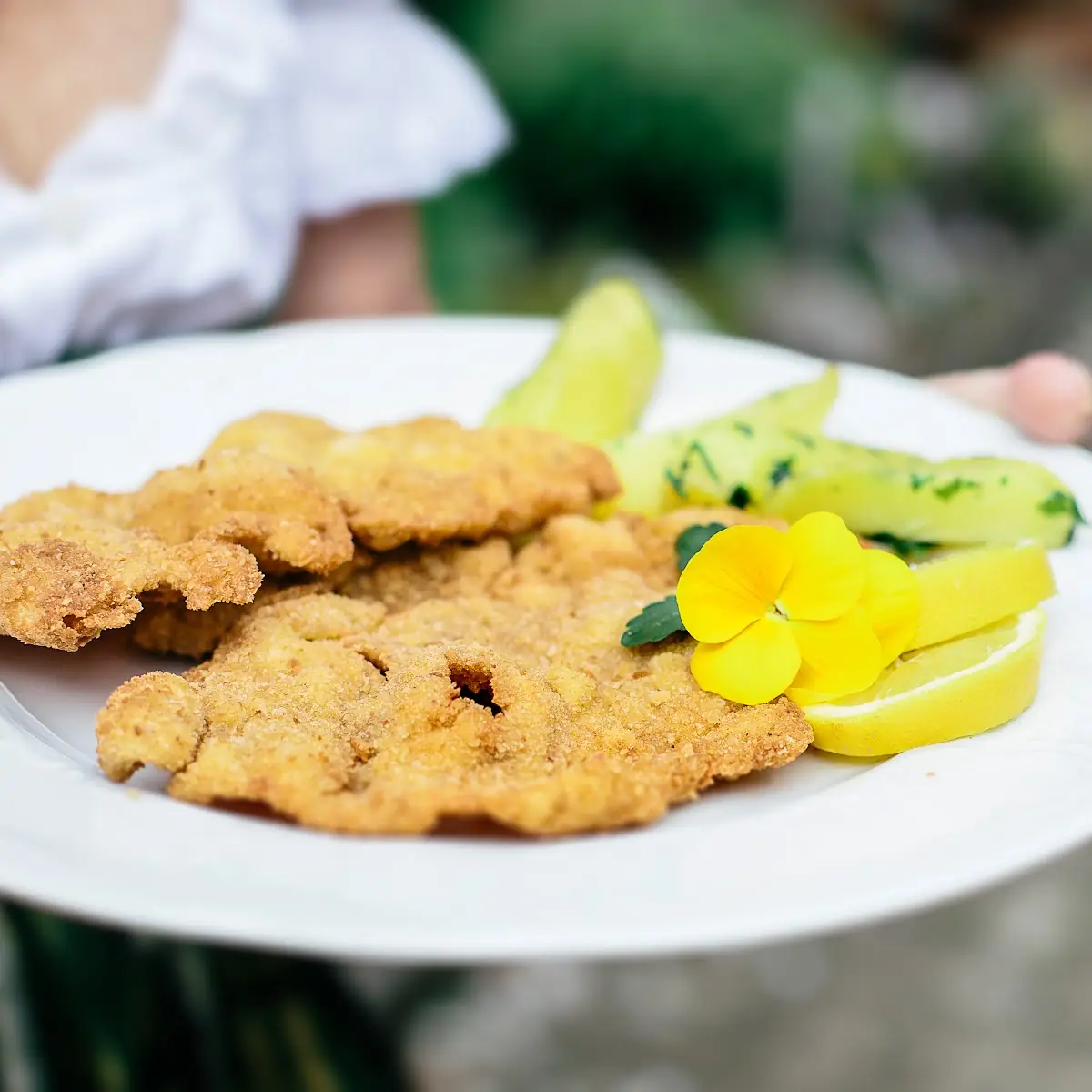 Wiener Schnitzel Fried in Butter with Parsley Seasoned Potatoes