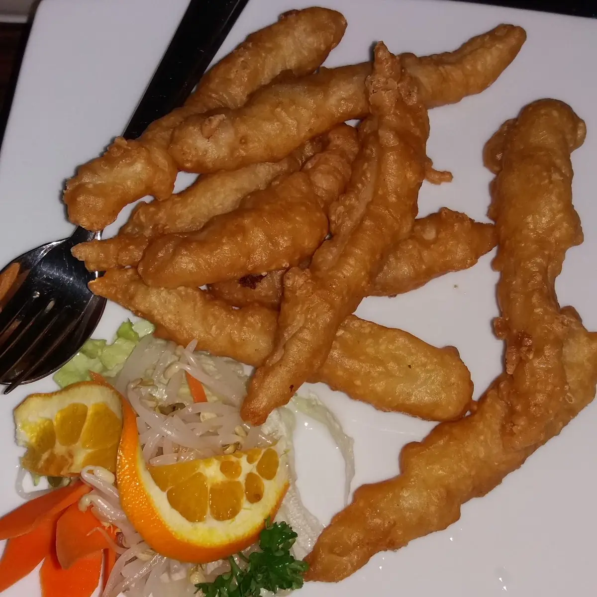 Gebackenes Hühnerfleisch mit Orangensauce