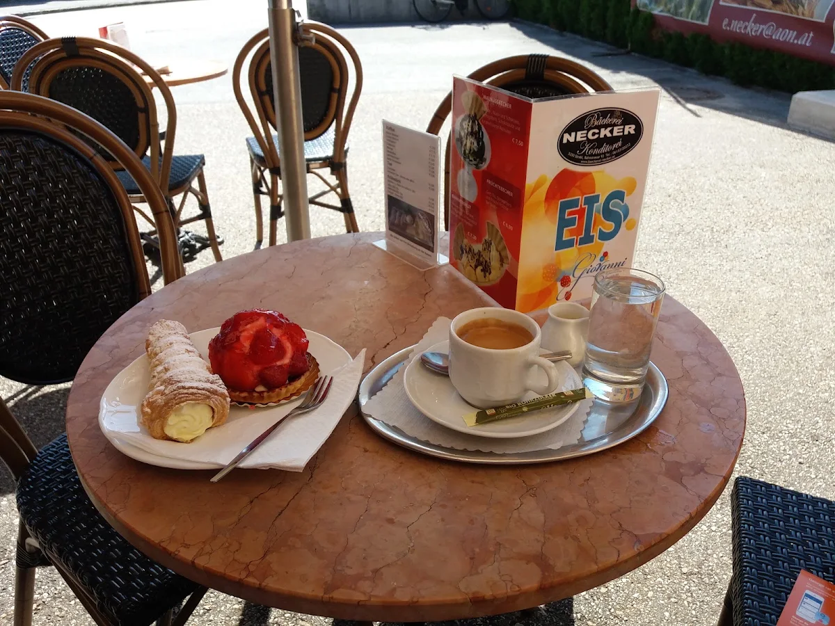 Cream Horn and Fresh Strawberry Tart Served with Coffee