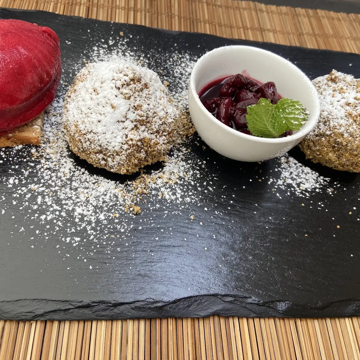 Nougat-marzipan-knödel Mit Sauerkirschen Und Kakaobutter-ingwer-eis