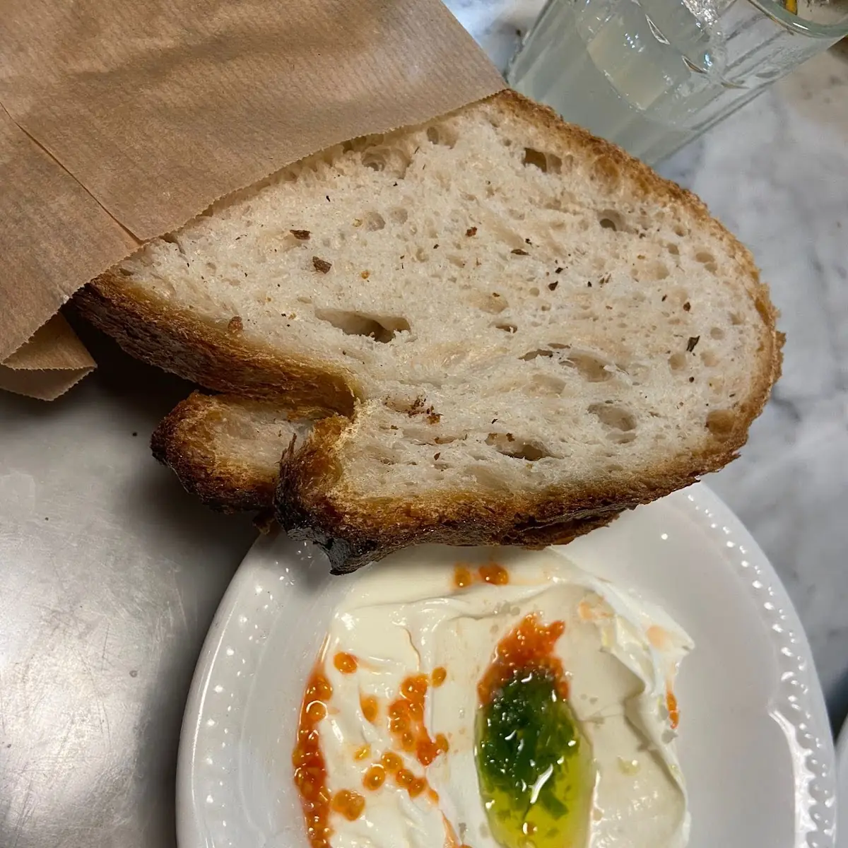Sourdough Bread Tomato Seeds Squeezed on Crème Fraîche