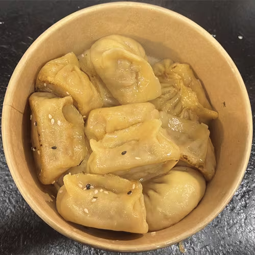 Jiao Zi mit Hühnerfleisch und Karotten (12 Stück)