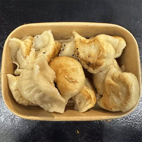 Jiao Zi mit Hühnerfleisch und Bärlauch (18 Stück)