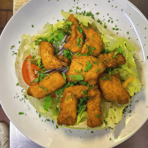 Gebackene Hühnerstreifen Salat
