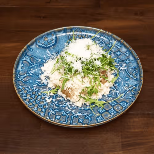 Risotto ai Funghi Porcini con Parmigiano e Rucola