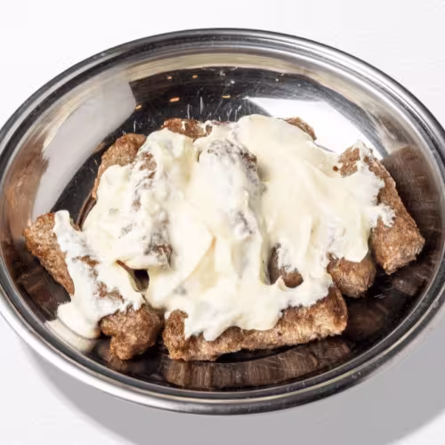 Cevapcici in Kajmak (10 Stück)