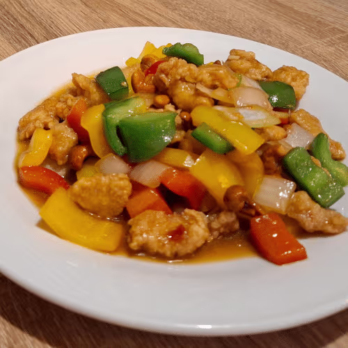 Hühnchen Chasewnüsse auf Reis