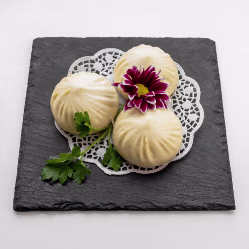 Gedämpfte Teigknödel mit Vanillefüllung