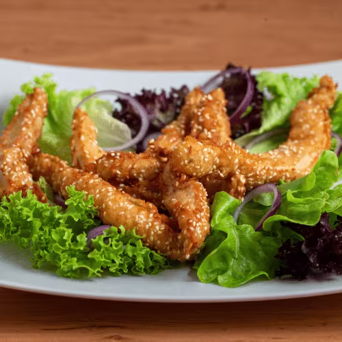Hausgemachte Chicken Nuggets paniert mit Sesamkörner (6 Stück)