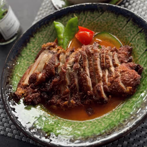 T4  Rotes Thai Curry mit knuspriger Ente